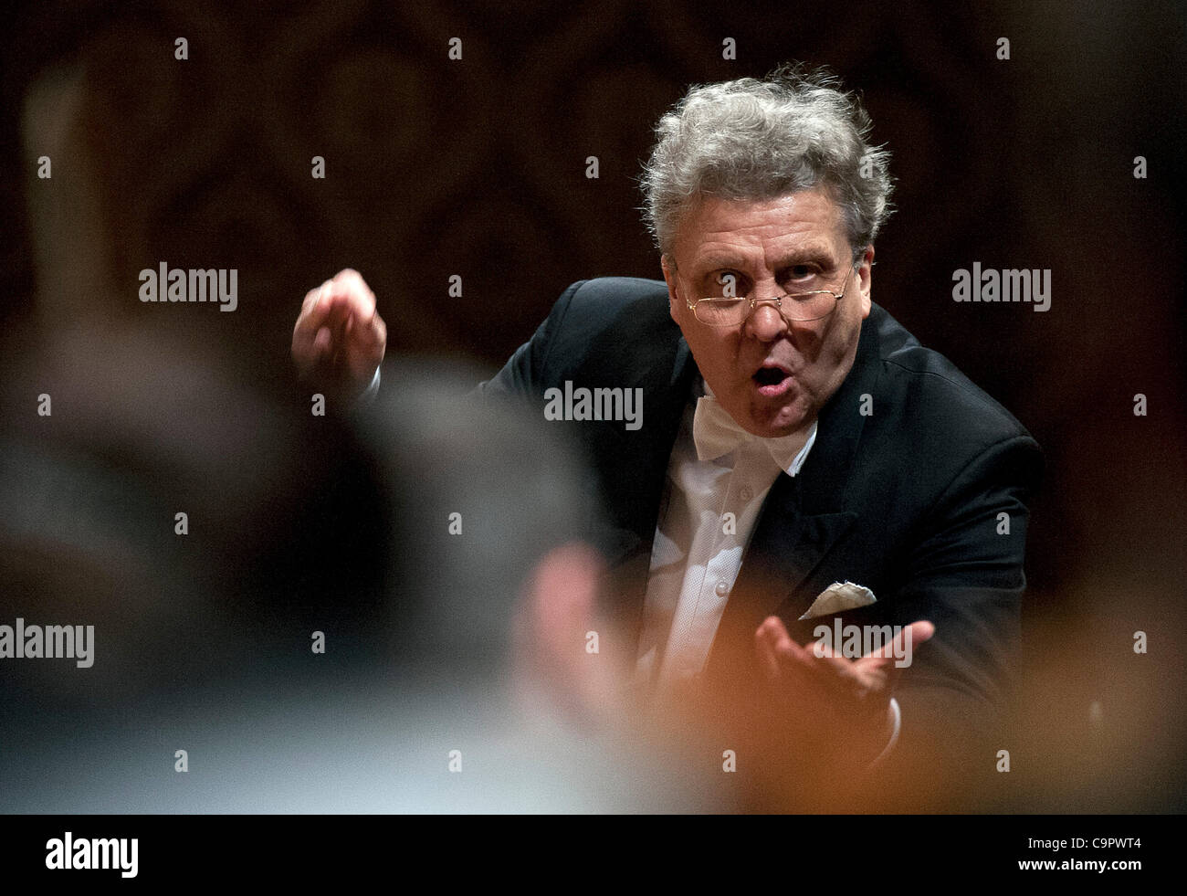 Russian conductor Vassily Sinaisky performs with the Czech Philharmonic Orchestra in Prague, Czech Republic, on Thursday, February 9, 2012. (CTK Photo/Michal Dolezal) Stock Photo