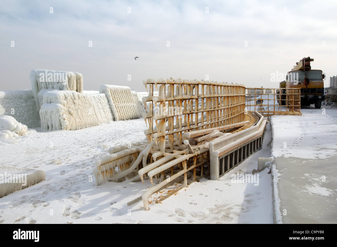 icy pier, frozen Black Sea, a rare phenomenon, last time it occured in 1977, Odessa, Ukraine, Eastern Europe Stock Photo