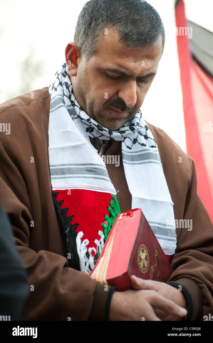 BEIT JALA, OCCUPIED PALESTINIAN TERRITORIES - FEBRUARY 10: Palestinians hold a Mass as a nonviolent witness against the Israeli separation barrier in the West Bank town of Beit Jala. Stock Photo