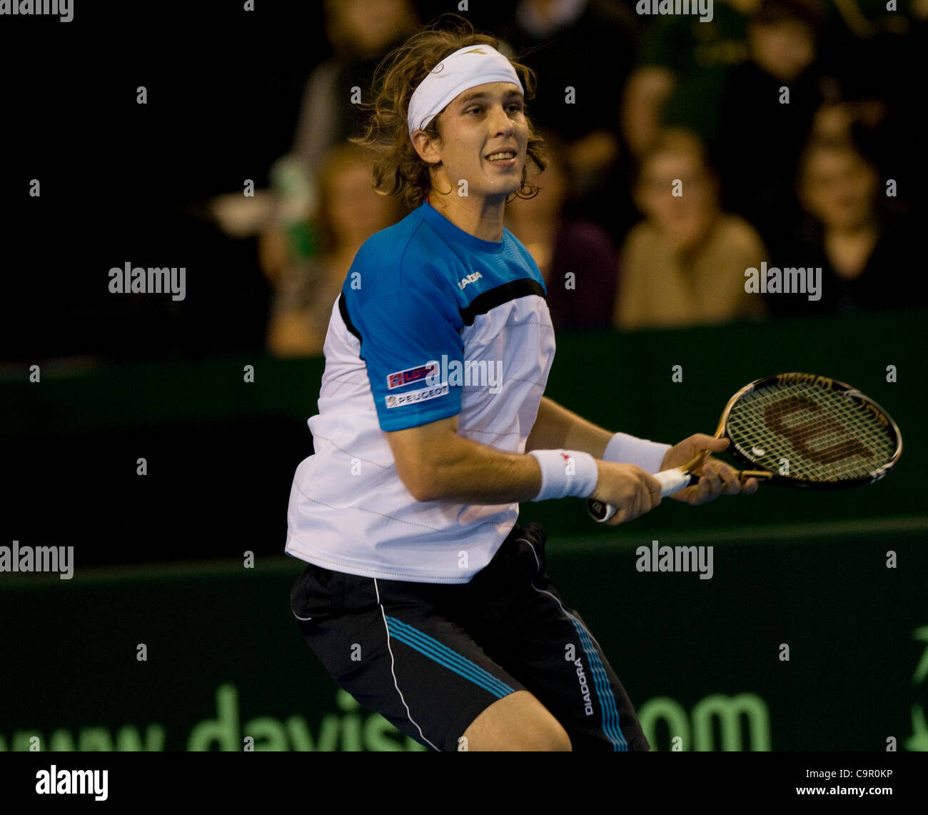 Dan Evans and Lucas Lacko contest the first match in the Davis cup by BNP Paribas, Great Britain v Slovak Republic tie at Glasgows' Braehead Arena. Stock Photo