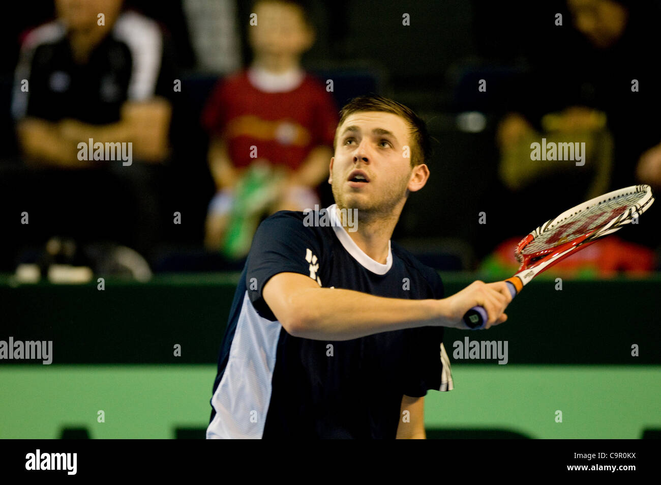 Dan Evans and Lucas Lacko contest the first match in the Davis cup by BNP Paribas, Great Britain v Slovak Republic tie at Glasgows' Braehead Arena. Stock Photo