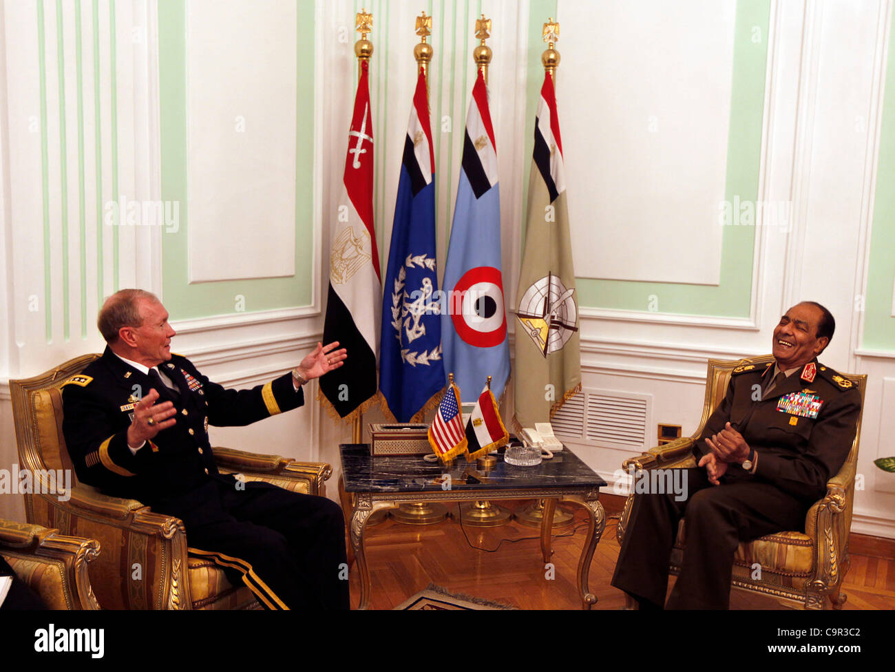 U.S. Chairman of the Joint Chiefs of Staff, Gen. Martin Dempsey, left, meets with Field Marshal Mohamed Hussein Tantawi, head of Egypt's ruling military council,right, at the Ministry of Defense in Cairo, Egypt, Saturday, Feb. 11, 2012. (AP Photo/Khalil Hamra, Pool) Stock Photo