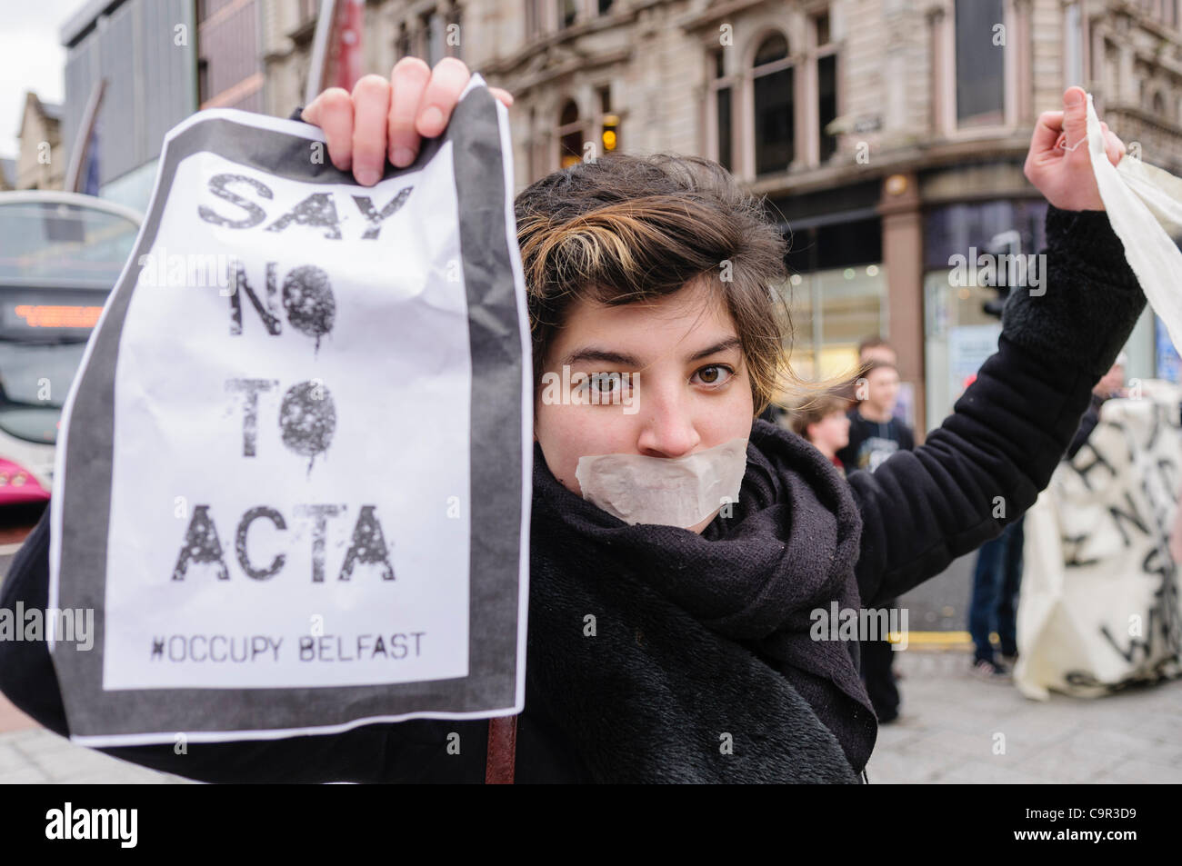 Occupy Belfast and Anonymous protest against ACTA. Belfast 11/02/2012 Stock Photo