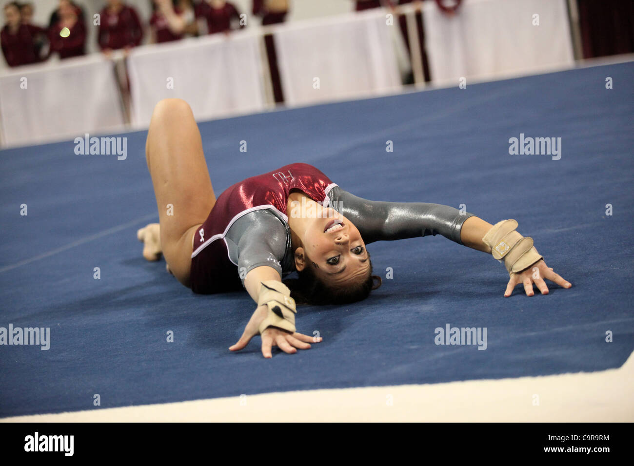 Nicole Tutewohl of Hamline University competes on the floor exercise during during the Best of Minnesota gymnastics competition at the University of Minnesota, Minneapolis, Minnesota, Feb. 11, 2012. Stock Photo