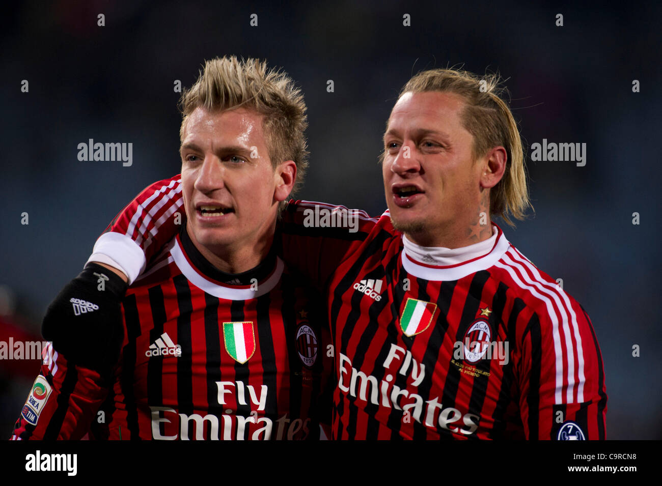 (L-R) Maxi Lopez, Philippe Mexes (Milan), FEBRUARY 11, 2012 - Football / Soccer : Maxi Lopez and Philippe Mexes of AC Milan celebrate after the Italian 'Serie A' match between Udinese 1-2 AC Milan at Stadio Friuli in Udine, Italy. (Photo by Maurizio Borsari/AFLO) [0855] Stock Photo