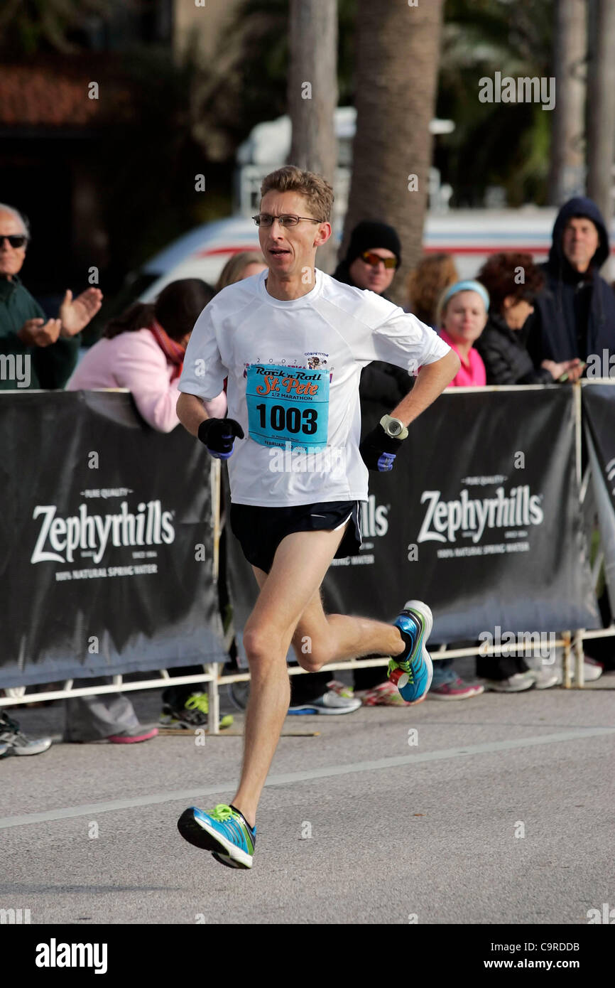 ANDREW CHANDLER of St. Petersburg, Florida, runs toward the finish line