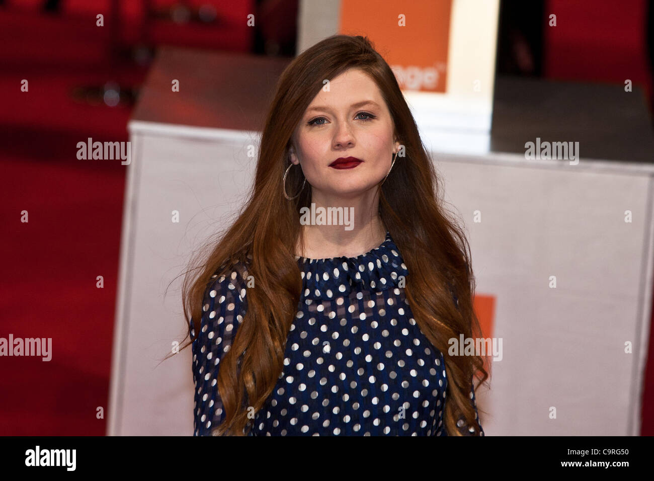 London, UK, 12/02/2012. Bonnie Wright on the red carpet arrives to attend the 2012 BAFTAs Stock Photo