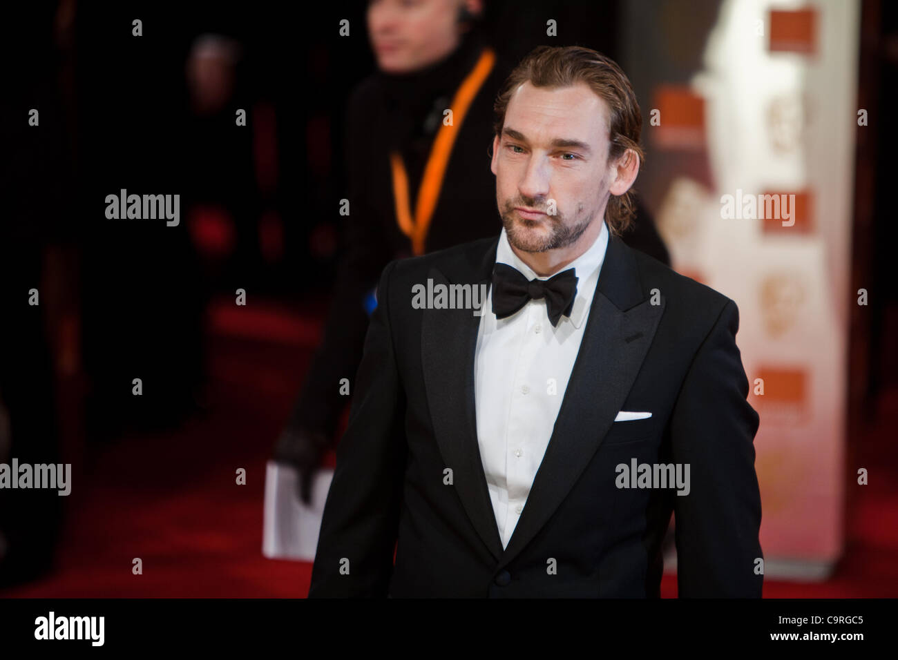 London, UK, 12/02/2012. Actor, Joseph Mawie arriving at the 2012 BAFTAs Stock Photo