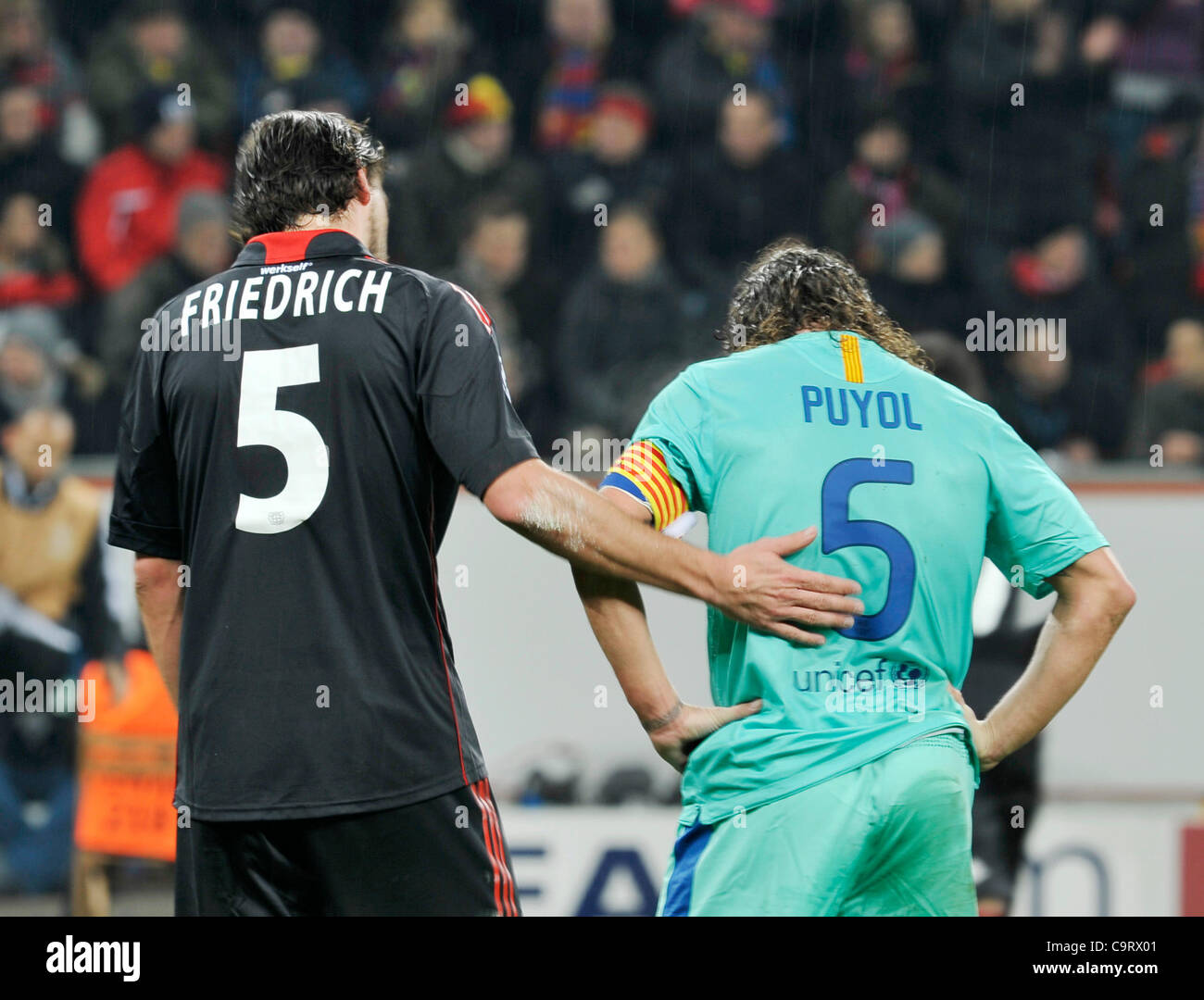 Soccer, UEFA Champions League, Leverkusen vs. FC Barcelona 1:3 --- Manuel Friedrich (Leverkusen) and Carles Puyol (Barcelona) Stock Photo