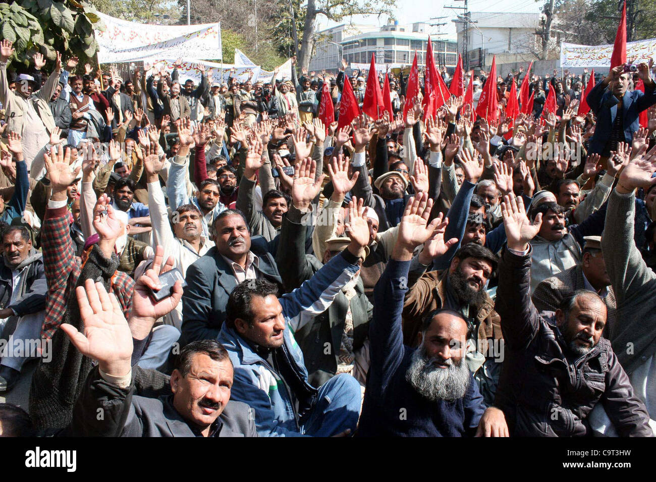 Members of WAPDA Hydro Electric Central Labor Union chant slogans in favor of their demands during a protest demonstration at Lahore press club on  Thursday, February 16, 2012. Stock Photo