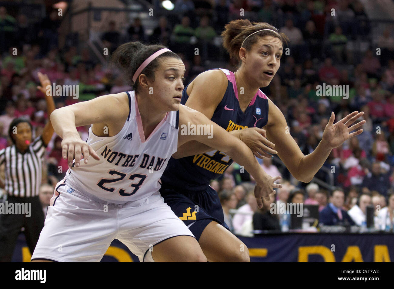 Feb. 12, 2012 - South Bend, Indiana, U.S - Notre Dame guard Kayla McBride (#23) and West Virginia forward Jess Harlee (#14) battle for position in first half action of NCAA Women's basketball game between West Virginia and Notre Dame.  The West Virginia Mountaineers upset the Notre Dame Fighting Iri Stock Photo