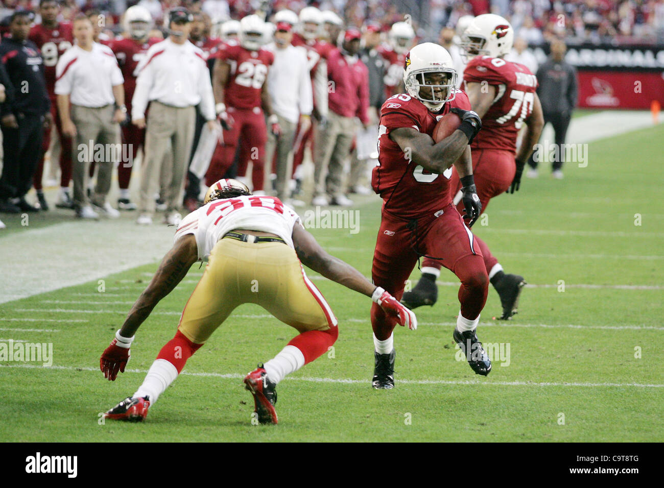 Sept. 2, 2010 - Glendale, Arizona, United States of America - Arizona  Cardinals wide receiver Early Doucet (#80) smiles on the sidelines during a preseason  game against the Washington Redskins at University