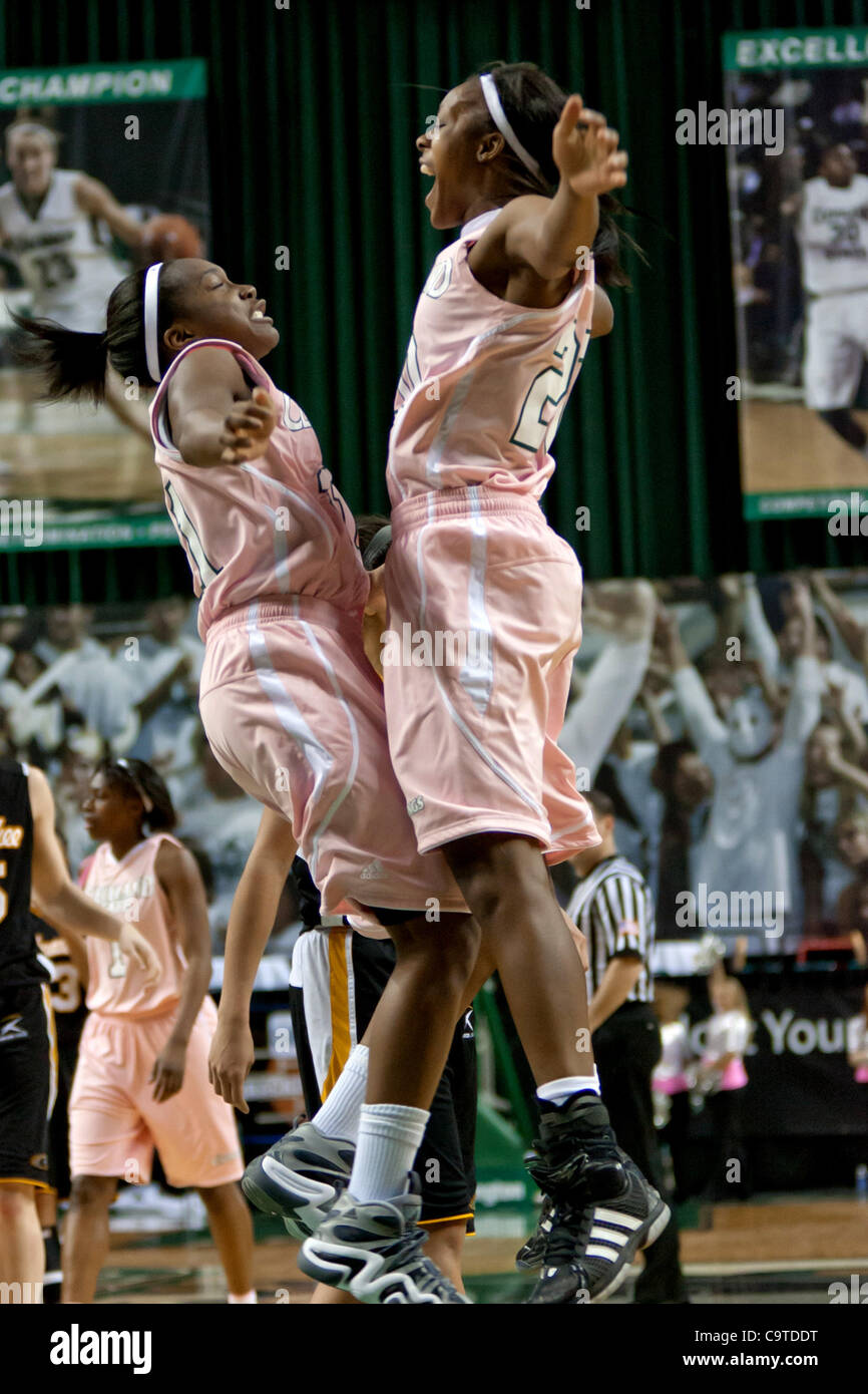 Feb. 18, 2012 - Cleveland, Ohio, U.S - Cleveland State guard Kiersten Green (21) and forward Shalonda Winton (20) chest bump to celebrate Green's game-winning shot with 0:07 seconds left against Milwaukee.  The Cleveland State Vikings came from behind to defeat the Milwaukee Panthers 70-68 at the Wo Stock Photo