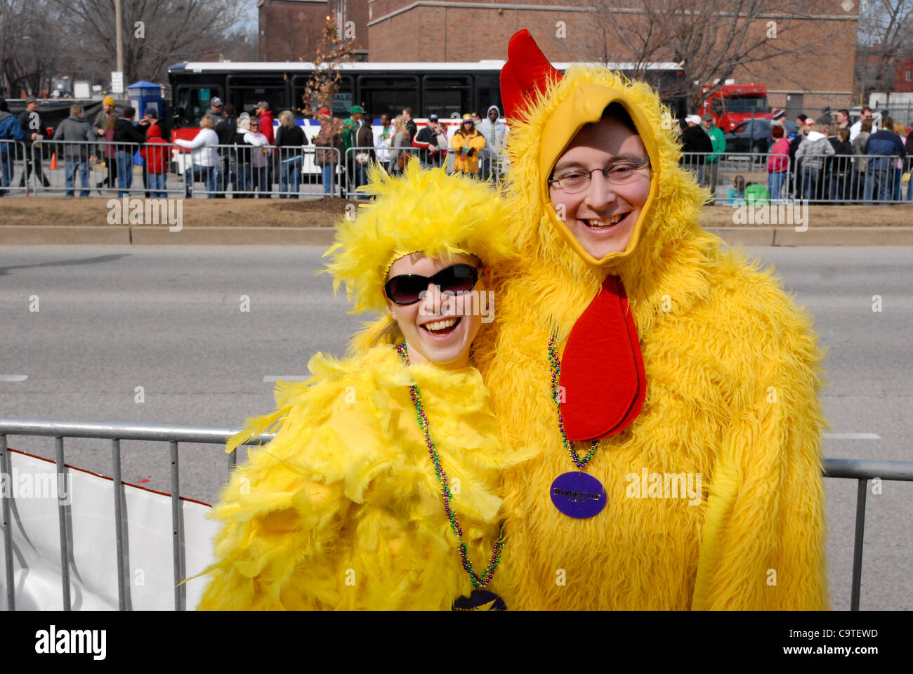 Feb. 18, 2012 - Saint Louis, Missouri, U.S - Ian Starr and Becky Everding dress in chicken costumes to show their Mardi Gras spirit while they wait for the parade to start during the 2012 Mardi Gras parade and festival at the Soulard District in St. Louis, MO. (Credit Image: © Richard Ulreich/Southc Stock Photo