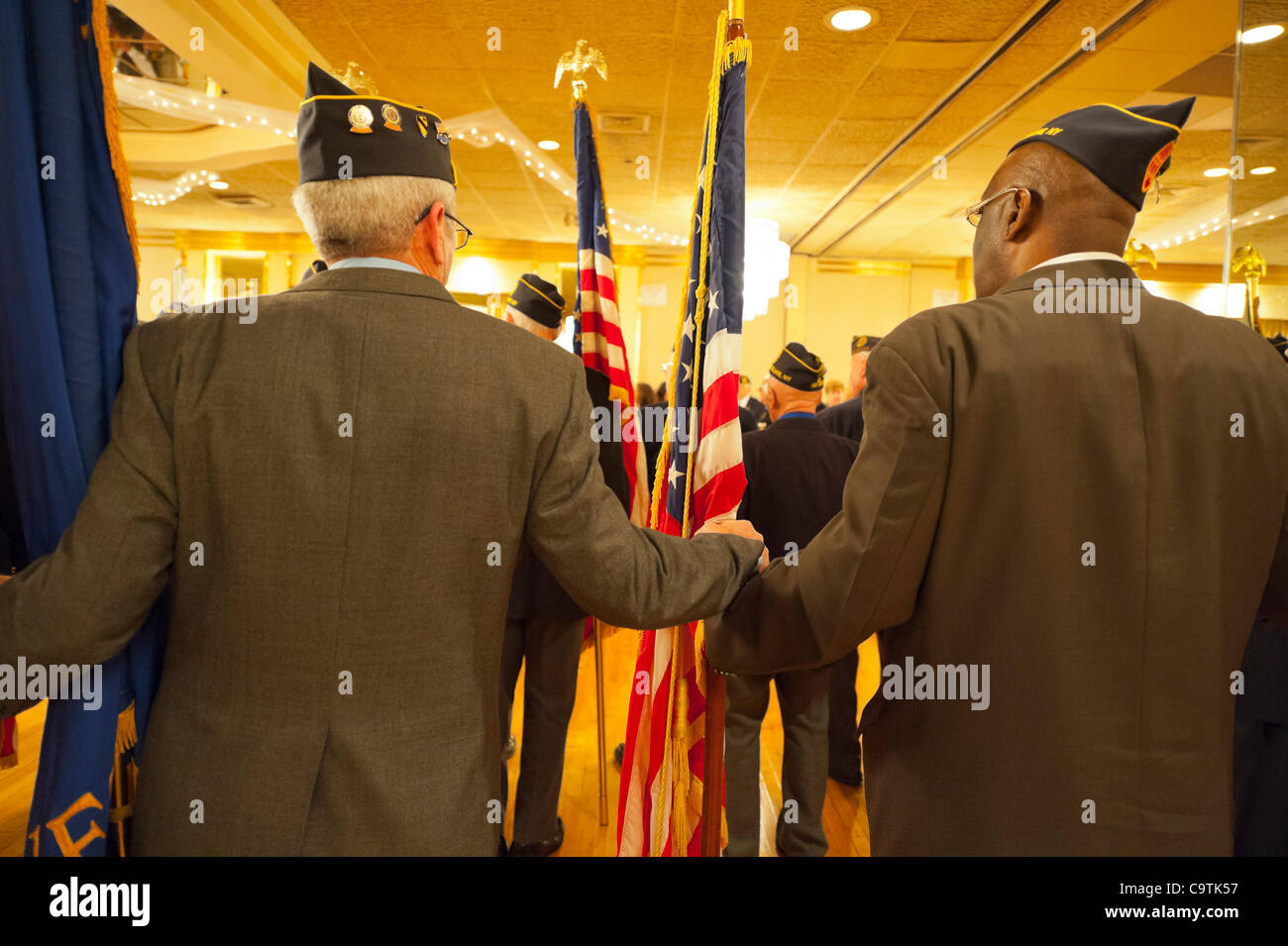 Veterans hold hands in brotherhood at American Legion's Military Ball