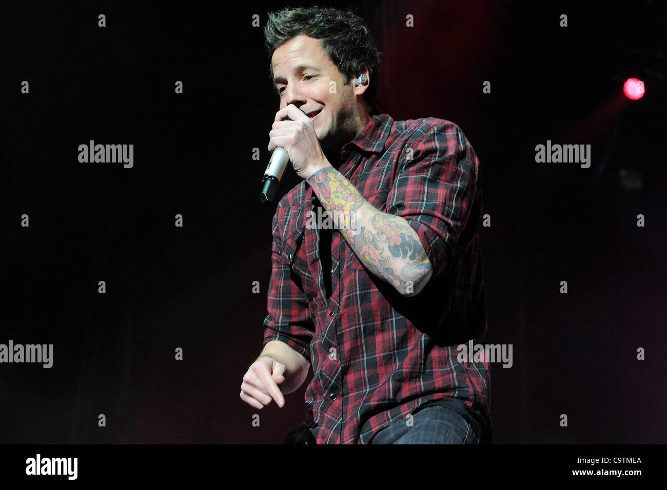 February 19, 2012 - Toronto, Canada - French-Canadian pop punk band Simple  Plan performs at The Air Canada Centre. In picture, lead singer Pierre  Bouvier Stock Photo - Alamy