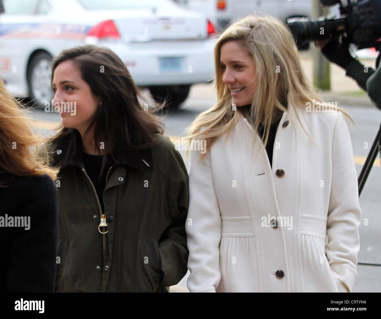 Feb. 18, 2012 - Charlottesville, Virginia, UNITED STATES - CHARLOTTESVILLE, VA - FEBRUARY 17:  Caroline Wattenmaker, left, and Kate Kamber, right, both testified they were at George Huguely's apartment when Yeardley Love argued and hit  Huguely over the head with her purse a week prior to her murder Stock Photo