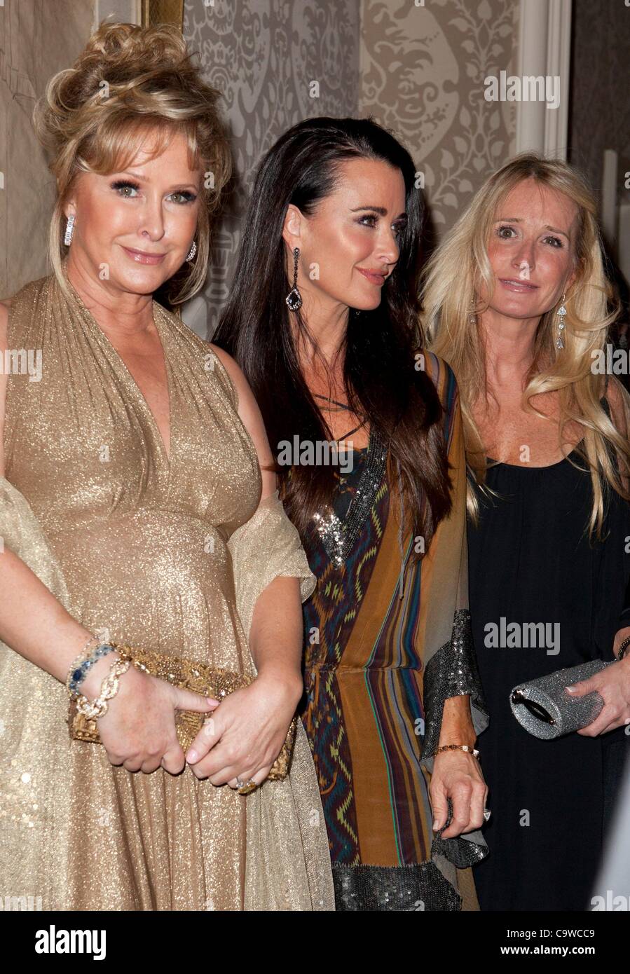 Kathy Hilton, Kyle Richards, Kim Hilton at arrivals for QVC Buzz on the Red Carpet Oscar Party, Four Seasons Hotel, Los Angeles, CA February 23, 2012. Photo By: Emiley Schweich/Everett Collection Stock Photo