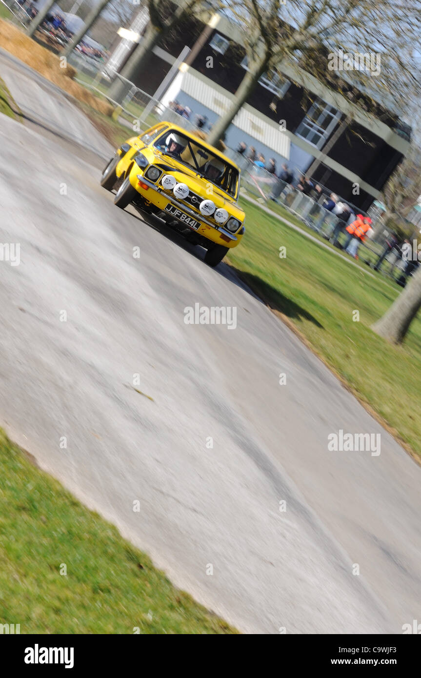 25th Feb 2012 - Stoneleigh Park, Coventry, UK.  Paul Howarth driving a 1973 Opel Ascona A in the Live Rally Stage at Race Retro Stock Photo