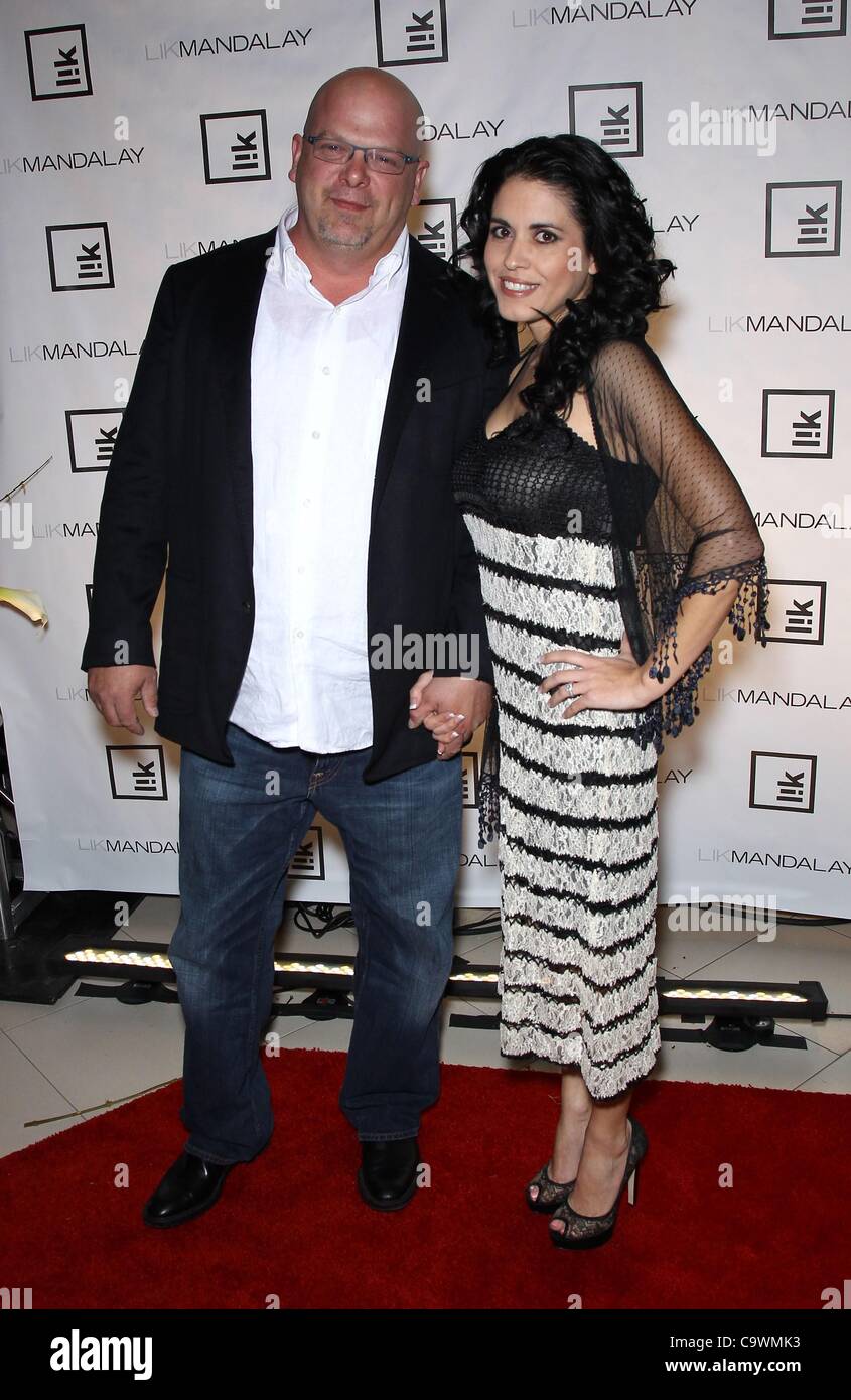 Rick Harrison, Deanna Burditt at arrivals for Peter Lik Gallery Grand