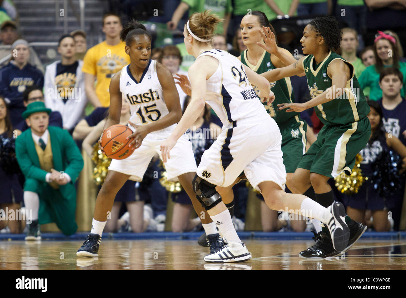 Feb. 25, 2012 - South Bend, Indiana, U.S - Notre Dame guard Kaila Turner (#15) looks to pass the ball to guard Natalie Novosel (#21) in first half action of NCAA Women's basketball game between South Florida and Notre Dame.  The Notre Dame Fighting Irish defeated the South Florida Bulls 80-68 in gam Stock Photo