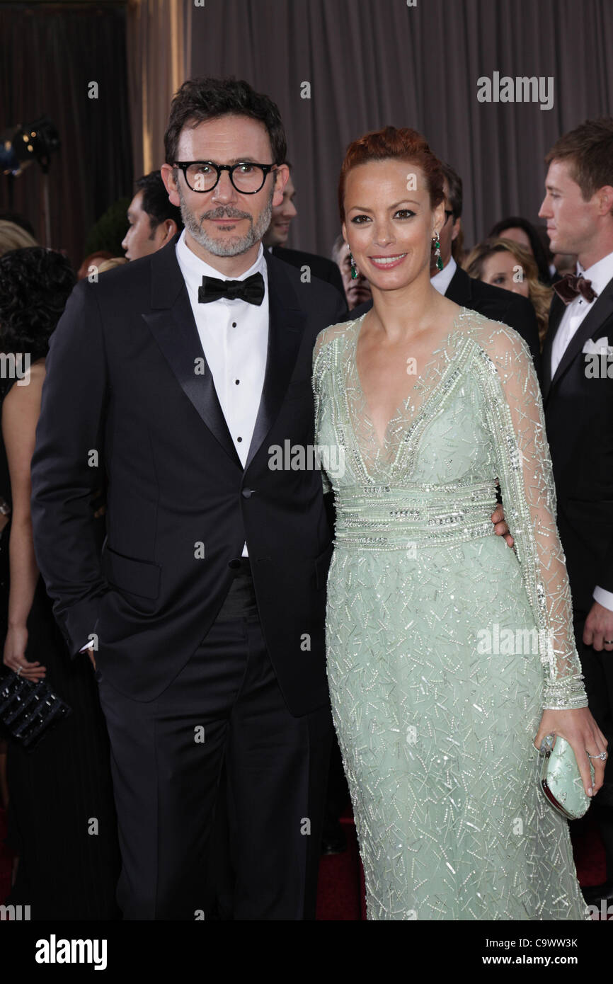 Feb. 26, 2012 - Hollywood, California, U.S. - Director MICHEL HAZANAVICIUS and Actress BERENICE BEJO in an Elie Sabb mint green long sleeved beaded gown on the Oscar red carpet at the 84th Academy Awards, The Oscars, in front of Kodak Theatre. (Credit Image: © Lisa O'Connor/ZUMAPRESS.com) Stock Photo