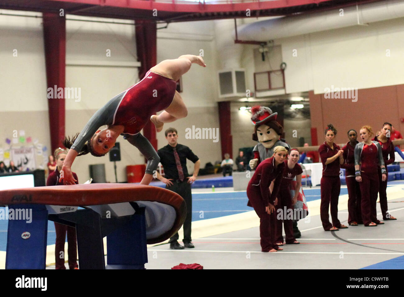 Hamline University gymnast Rachel Henrickson takes a leap on the vault, Hamline University field house, Saint Paul, Minnesota, Feb. 26, 2012. Hamline lost its home meet to Winona State University. Stock Photo