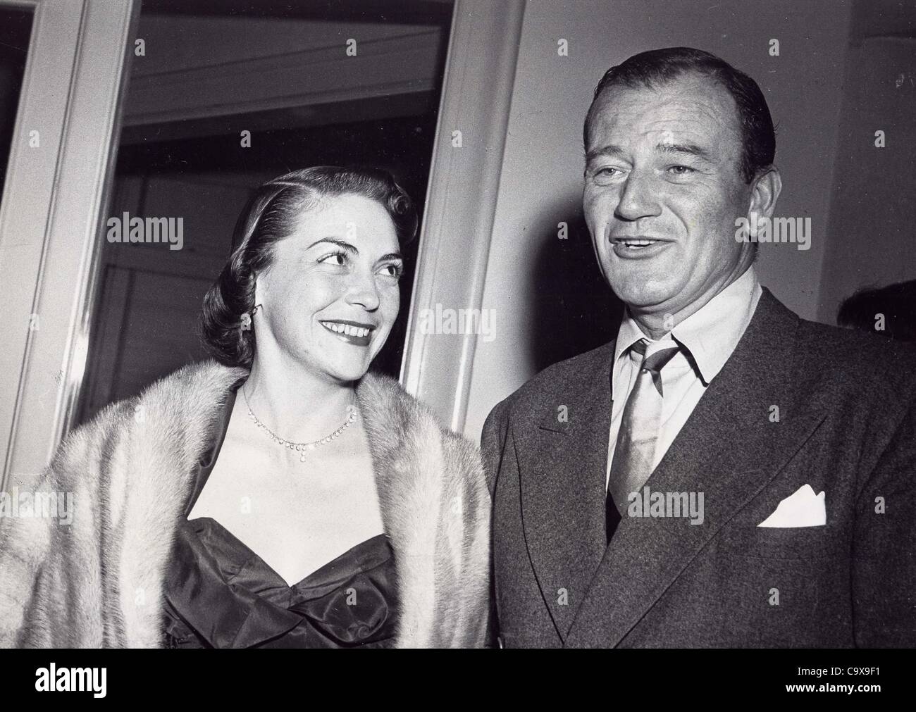 JOHN WAYNE with wife Esperanza Baur.Supplied by Photos, inc.(Credit ...