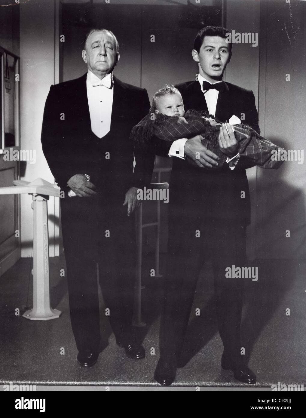 EDDIE FISHER with baby Donald Gray and butler Melville Cooper.Supplied by   Photos, inc..Bundle of Joy 1956.(Credit Image: Â© Supplied By Globe Photos, Inc/Globe Photos/ZUMAPRESS.com) Stock Photo