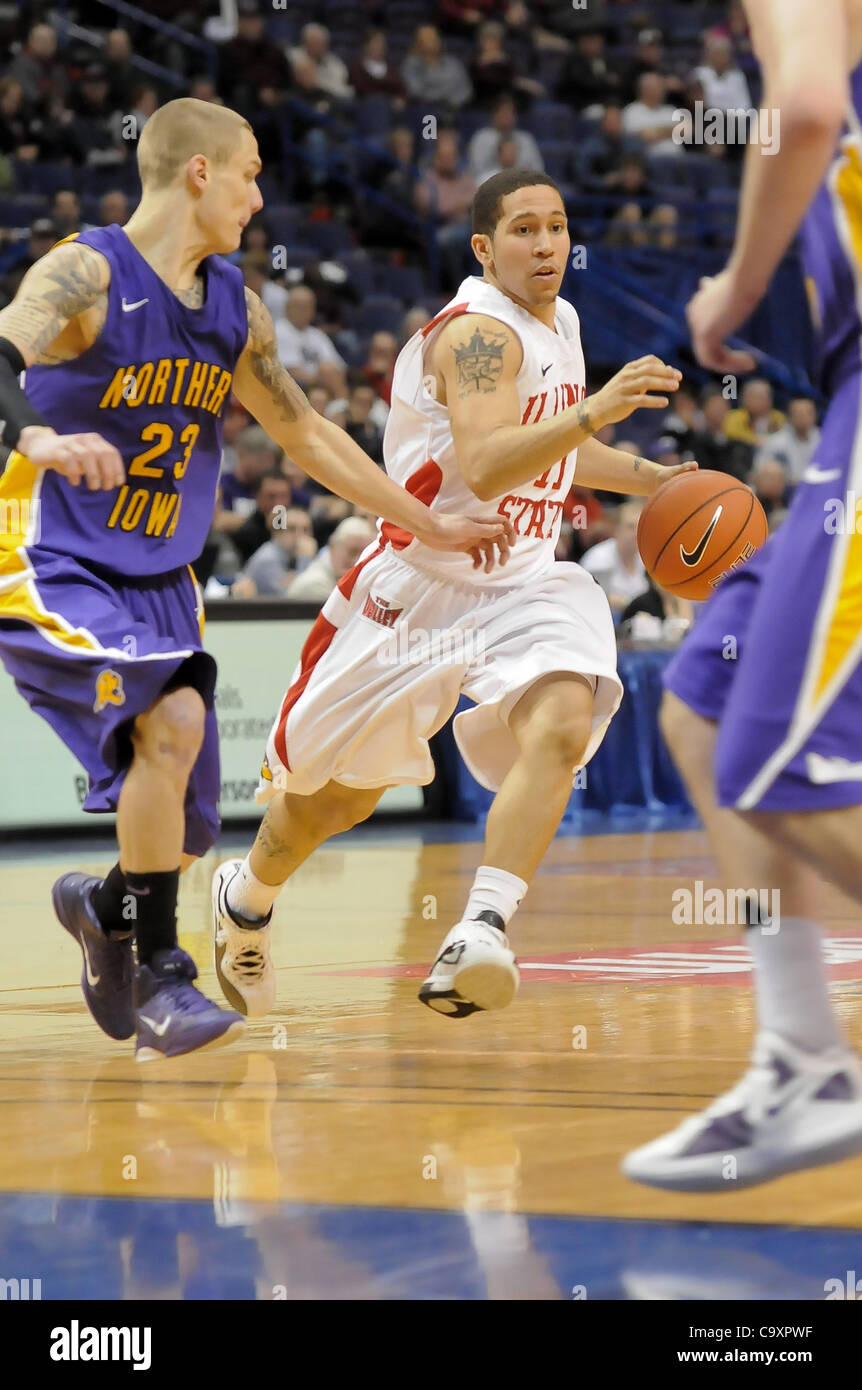 March 2, 2012 - St. Louis, Missouri, United States of America - Illinois State Nic Moore (11) attempts to drive the lane while defended by University of Northern Iowa Marc Sonnen (23) during the second round of the State Farm Missouri Valley Conference Men's Basketball Tournament at Scottrade Center Stock Photo