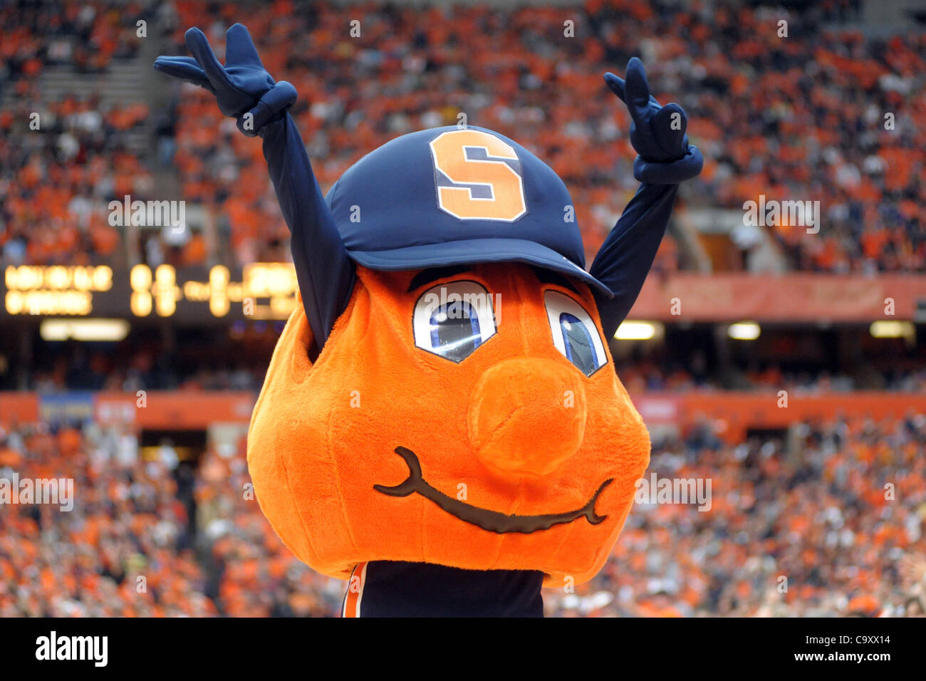 March 3, 2012 - Syracuse, New York, U.S - Syracuse mascot ''Otto'' waves to the crowd before the Orange game against the Louisville Cardinals at the Carrier Dome in Syracuse, NY. Syracuse leads Louisville 26-19 at the half. (Credit Image: © Michael Johnson/Southcreek/ZUMAPRESS.com) Stock Photo