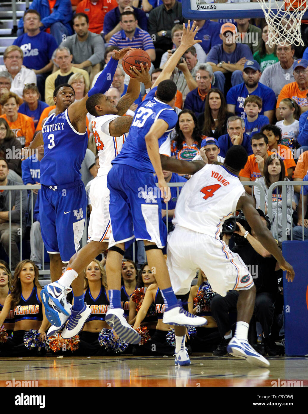 March 4, 2012 - Gainesville, KY, USA - UK's Terrence Jones blocked a shot by Florida's 23- Bradley Beal, as Anthony Davis applied additional pressure as the the University of Kentucky played the University of Florida in the O'Connell Center in Gainesville, Fl.,  Sunday, March 04, 2012. This is secon Stock Photo