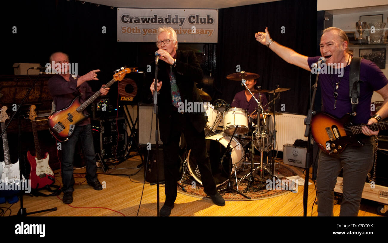 The iconic Crawdaddy Club is being revived on its 50th anniversary year at The Richmond Athletic Ground, where gigs were held in the 60's. The Blue Bishops perform with Elmer Gantry (Stretch,Curved Air, Velvet Opera). From left to right: Jim Rodford, Elmer Gantry, Justin Hildreth and Simon Burrett. Stock Photo