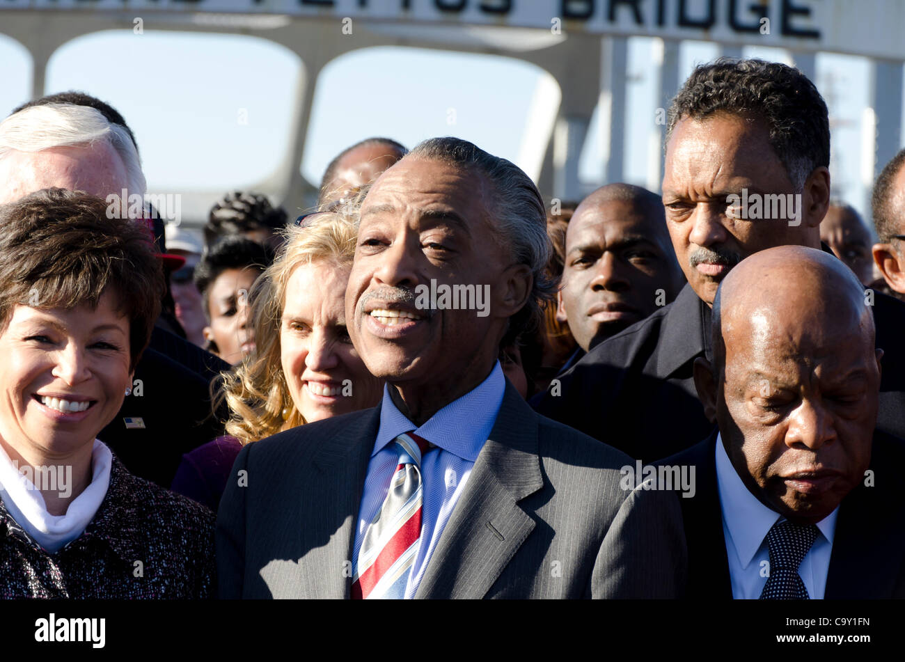 White House Senior Advisor Valerie Jarrett, Reverend Al Sharpton, U.S. Rep. John Lewis, and Reverend Jesse Jackson begin the reenactment of the Selma to Montgomery march on the Edmund Pettus Bridge on  Sunday, March 4, 2012.  The march was to commemorate the voting rights march in 1965. Stock Photo