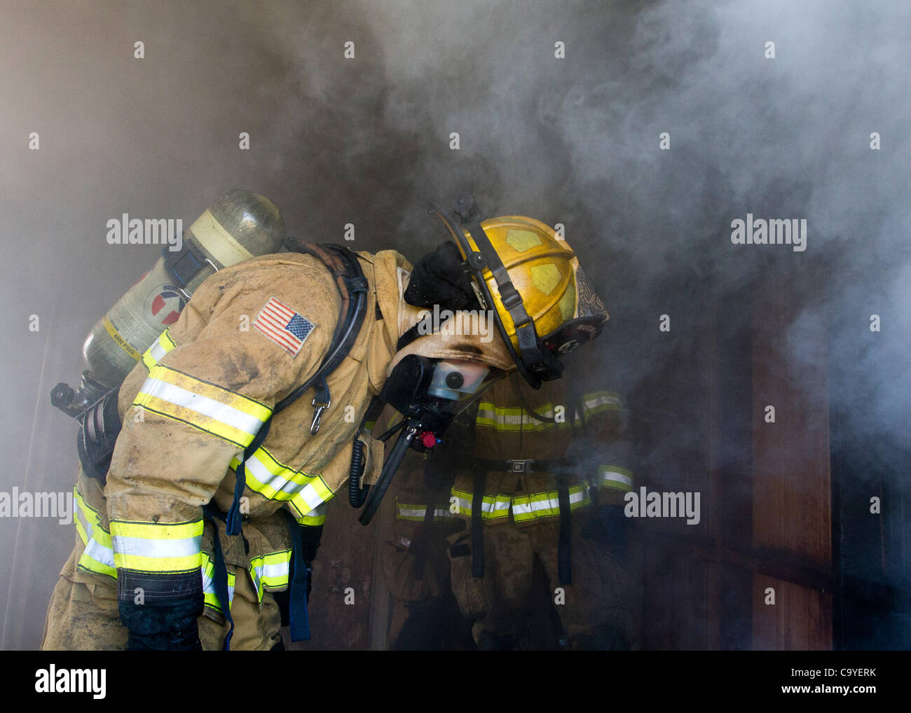 March 3, 2012 Hughson, CA, USA A Hughson firefighter looks for