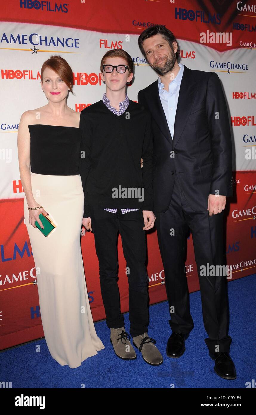 Julianne Moore, Caleb Freundlich, Bart Freundlich at arrivals for GAME CHANGE Premiere, The Ziegfeld Theatre, New York, NY March 7, 2012. Photo By: Kristin Callahan/Everett Collection Stock Photo