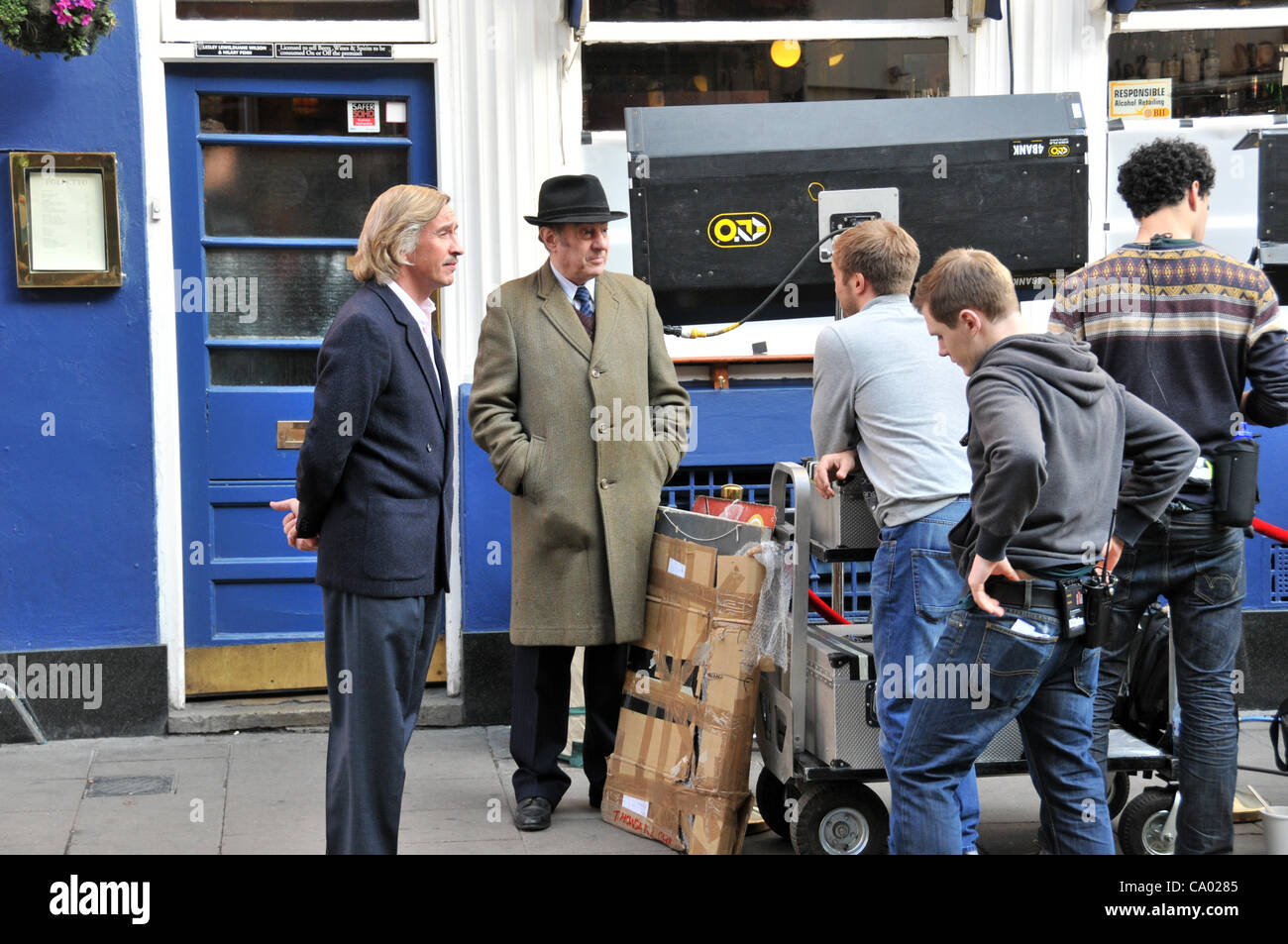 Soho London 11/3/12 Steve Coogan as Paul Raymond filming The Paul Raymond Story. Steve Coogan outside The French House in Soho waiting to continue filming. Stock Photo