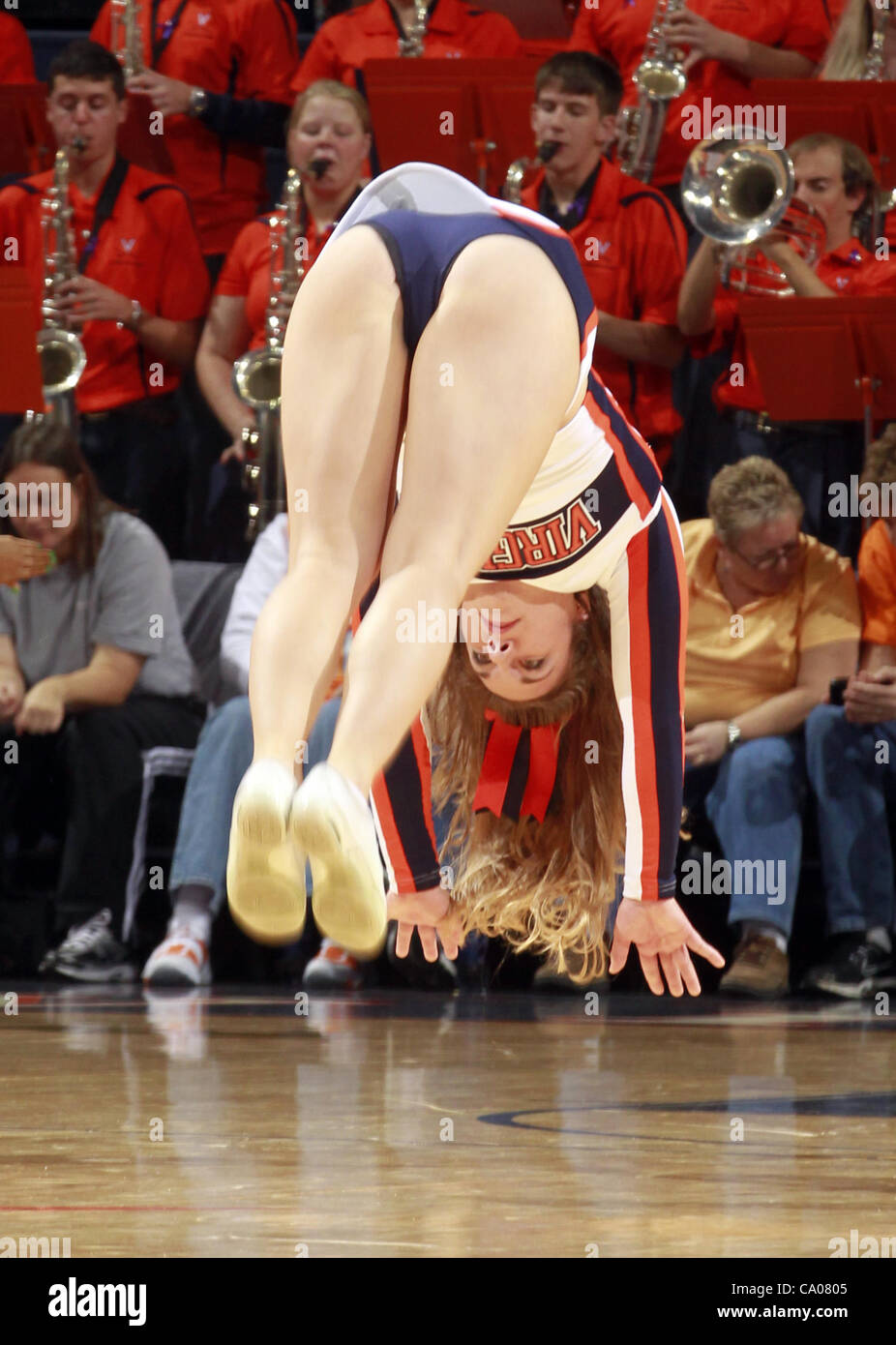 Nov. 20, 2011 - Charlottesville, Virginia, United States - Virginia Cavaliers cheerleaders tumble across the floor during the game on November 20, 2011 against the Tennessee Lady Volunteers at the John Paul Jones Arena in Charlottesville, Virginia. Virginia defeated Tennessee in overtime 69-64. (Cre Stock Photo