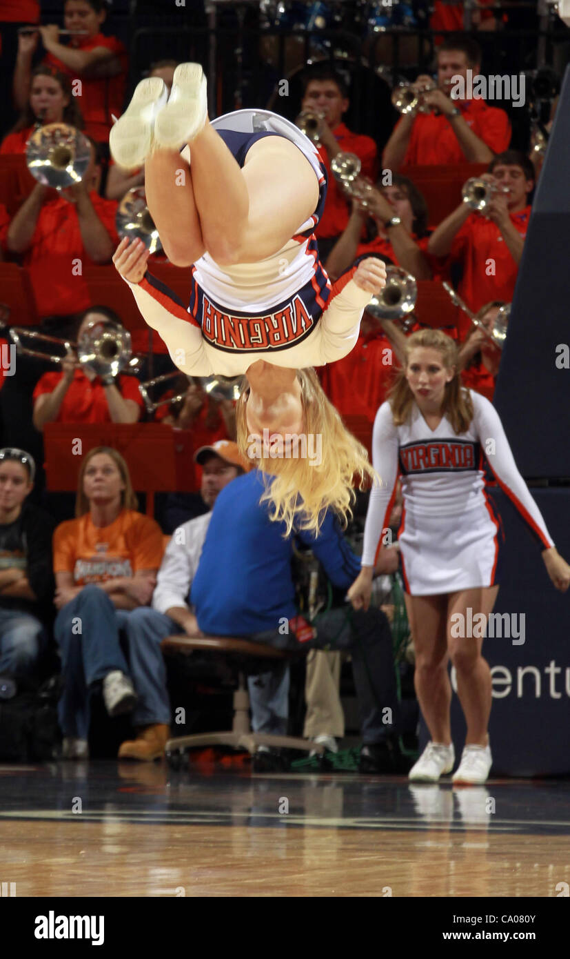 Nov. 20, 2011 - Charlottesville, Virginia, United States - Virginia Cavaliers cheerleaders tumble across the floor during the game on November 20, 2011 against the Tennessee Lady Volunteers at the John Paul Jones Arena in Charlottesville, Virginia. Virginia defeated Tennessee in overtime 69-64. (Cre Stock Photo