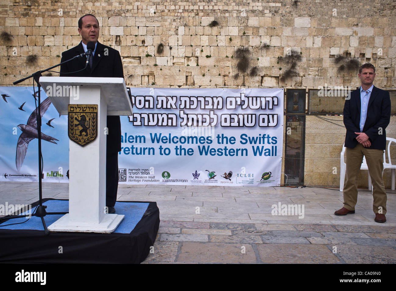 Jerusalem Mayor Nir Barkat addresses guests at a welcoming ceremony for thousands of swifts returning from South Africa to nest in the Western Wall as spring and breeding season arrive. Jerusalem, Israel. 12-Mar-2012. Stock Photo