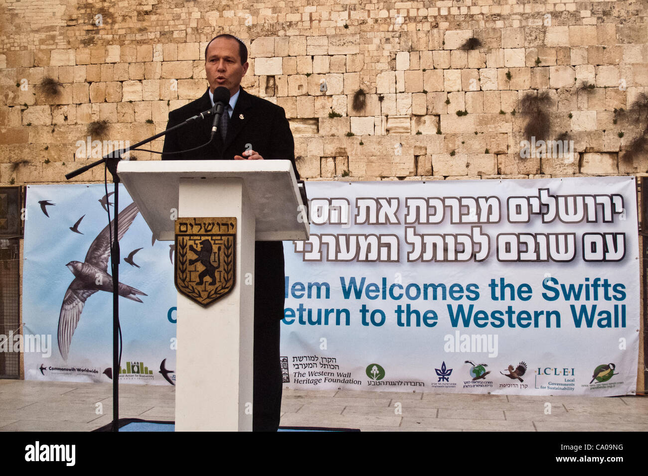 Jerusalem Mayor Nir Barkat addresses guests at a welcoming ceremony for thousands of swifts returning from South Africa to nest in the Western Wall as spring and breeding season arrive. Jerusalem, Israel. 12-Mar-2012. Stock Photo