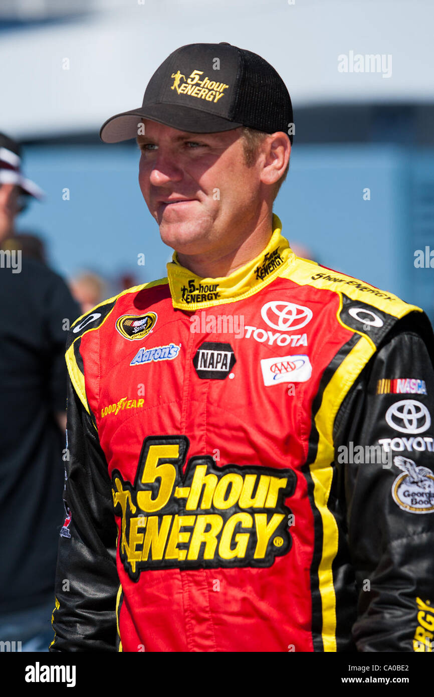 March 10, 2012 - Las Vegas, Nevada, U.S - Clint Bowyer, driver of the #15 5-hour Energy Toyota Camry, is on his way back to his hauler after checking on his car in the garages at the NASCAR Sprint Cup Series Kobalt Tools 400 at Las Vegas Motor Speedway in Las Vegas, Nevada. (Credit Image: © Matt Gdo Stock Photo