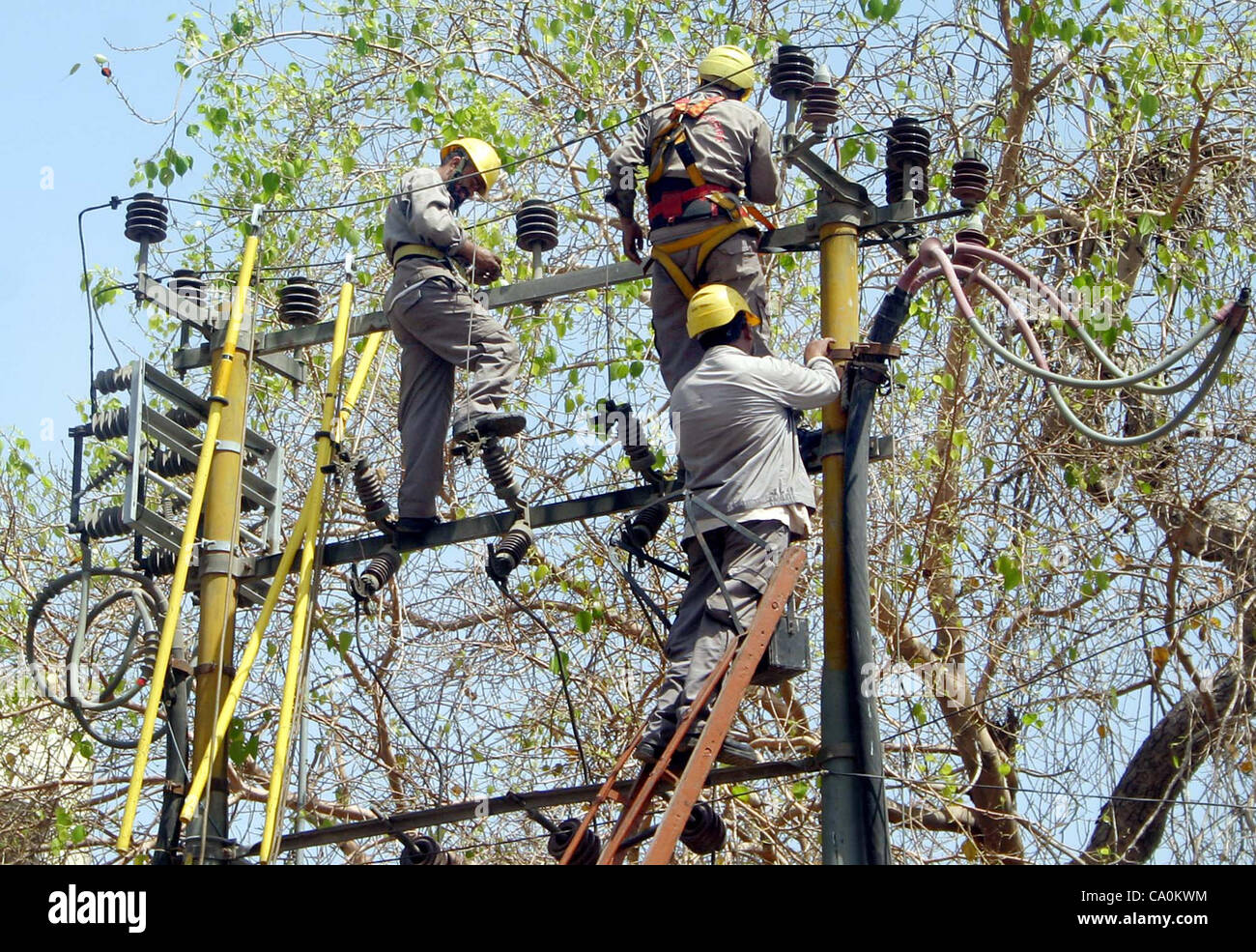 Karachi electric supply company (KESC) workers busy in work at an