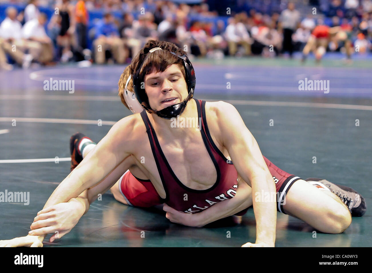 March 15, 2012 - St. Louis, Missouri, United States of America - Jordan  Keller from Oklahoma tries to escape the clutches of his opponent during  the opening round of the NCAA Division