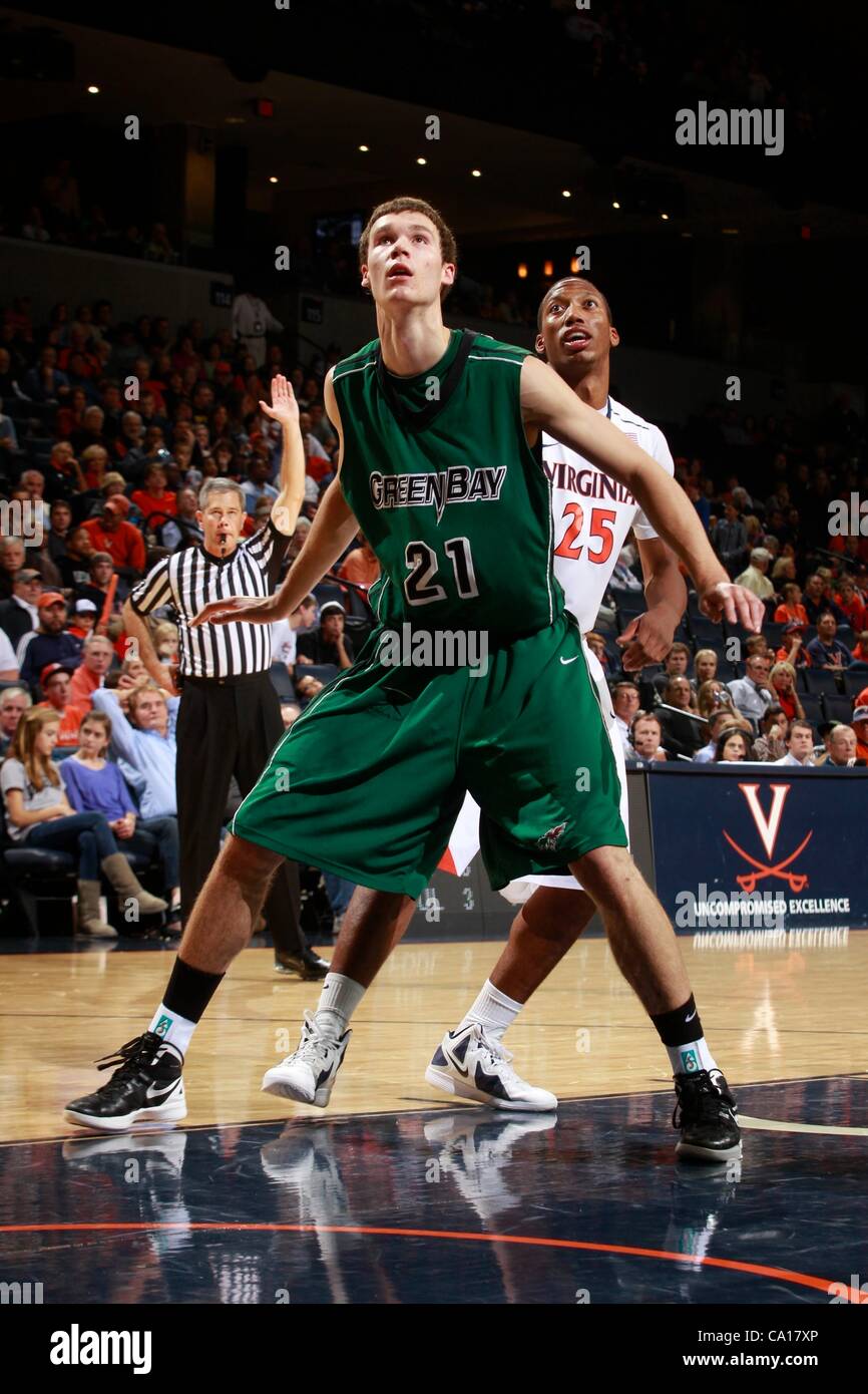 ALEC BROWN #21 of the Green Bay Phoenix looks for the rebound during the game at the John Paul Jones Arena. Virginia defeated Green Bay 68-42. Stock Photo