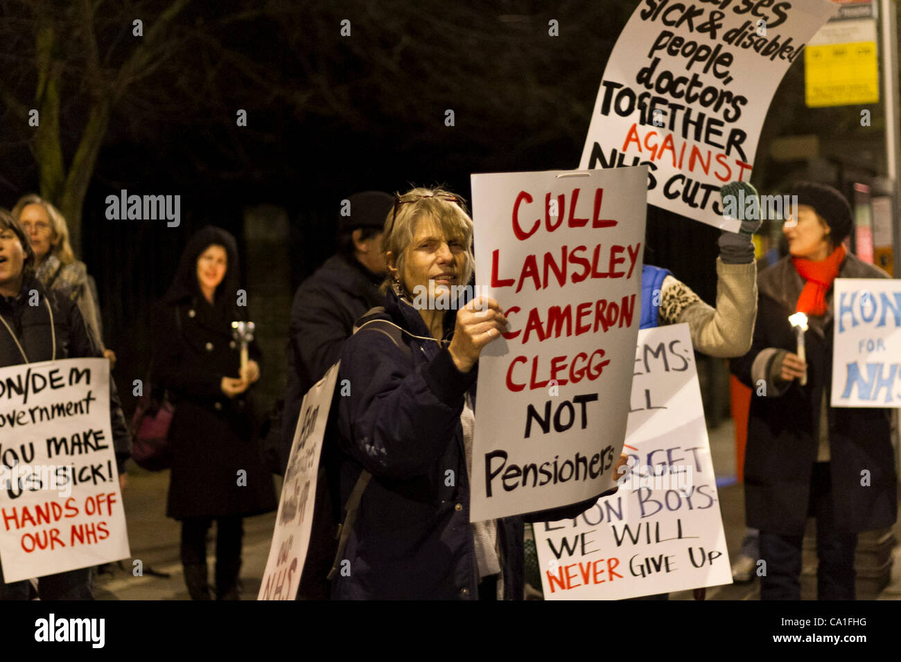 London, UK. 19/03/12. Protesters held  'Drop the NHS bill' candlelit vigil at Lambeth Palace Gardens park entrance. The proposes NHS Bill is to create a independent NHS Board, promote patient choice, and to reduce NHS administration costs. Stock Photo