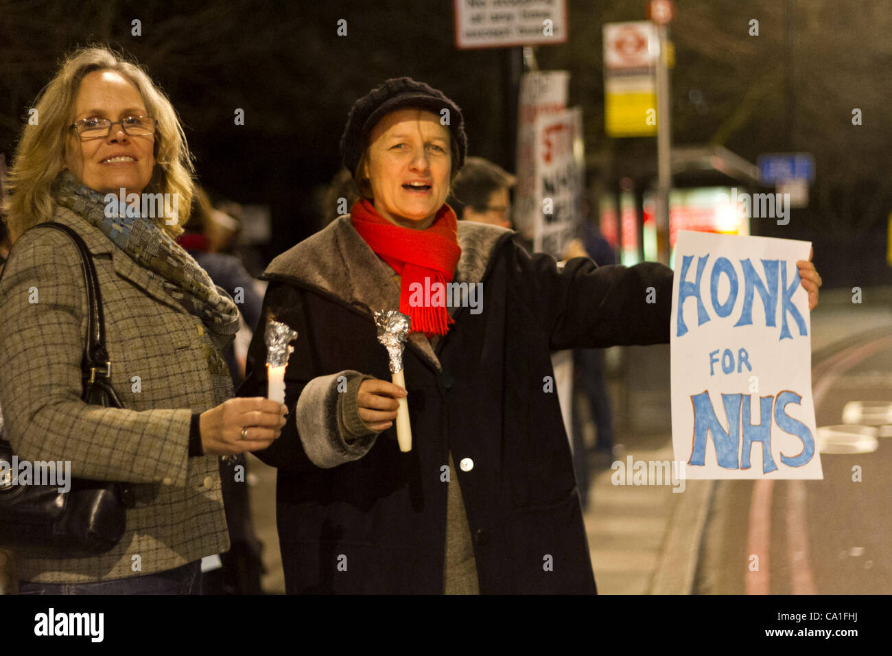 London, UK. 19/03/12. Protesters held  'Drop the NHS bill' candlelit vigil at Lambeth Palace Gardens park entrance. The proposes NHS Bill is to create a independent NHS Board, promote patient choice, and to reduce NHS administration costs. Stock Photo