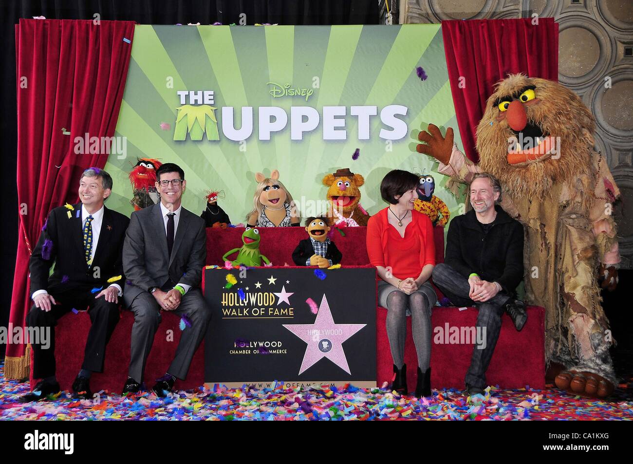 Leron Gubler, Animal, Rich Ross, Pepe, Kermit, Miss Piggy, Walter, Fozzie, Lisa Henson, Gonzo, Brian Henson, Sweetums at the induction ceremony for Star on the Hollywood Walk of Fame forThe Muppets, Hollywood Boulevard, Los Angeles, CA March 20, 2012. Photo By: Michael Germana/Everett Collection Stock Photo