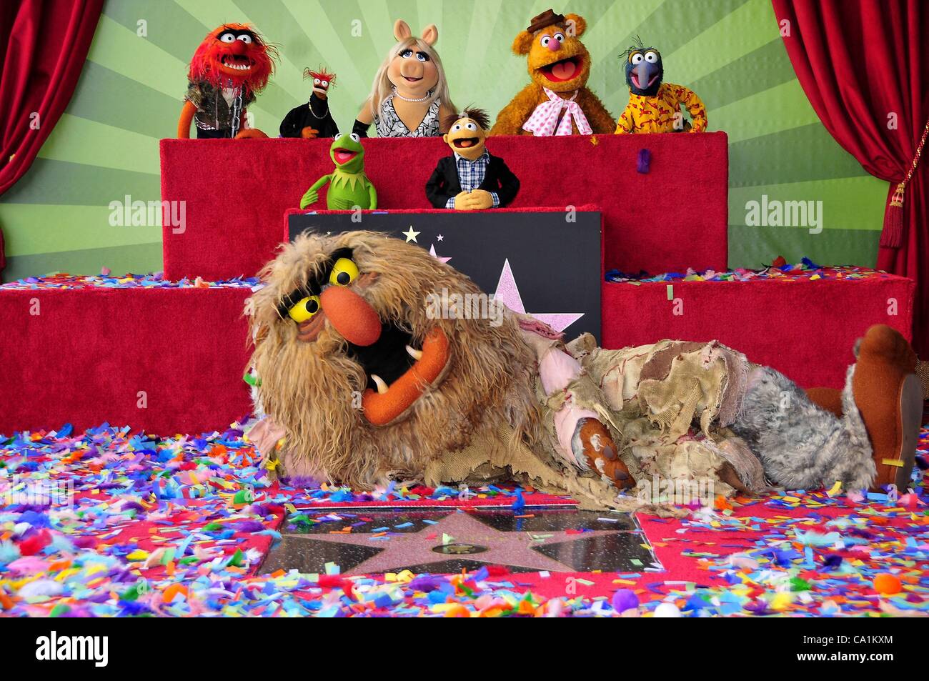 Animal, Pepe, Kermit, Sweetums, Miss Piggy, Walter, Fozzie, Gonzo at the induction ceremony for Star on the Hollywood Walk of Fame forThe Muppets, Hollywood Boulevard, Los Angeles, CA March 20, 2012. Photo By: Michael Germana/Everett Collection Stock Photo