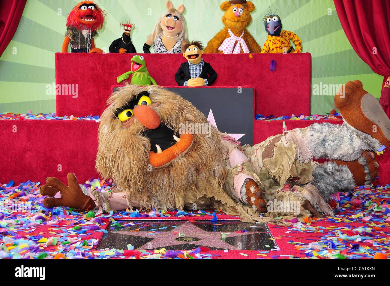 Animal, Pepe, Kermit, Sweetums, Miss Piggy, Walter, Fozzie, Gonzo at the induction ceremony for Star on the Hollywood Walk of Fame forThe Muppets, Hollywood Boulevard, Los Angeles, CA March 20, 2012. Photo By: Michael Germana/Everett Collection Stock Photo